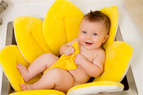 Lower baby into the plush flower that perfectly cradles your baby and admire the smiles. Blooming Bath - Project Nursery