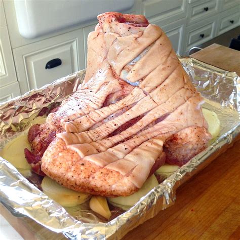 Place pork shoulder on a rack in a roasting pan. JULES FOOD...: Slow Roasted Bone-in Pork Butt with CRISPY ...