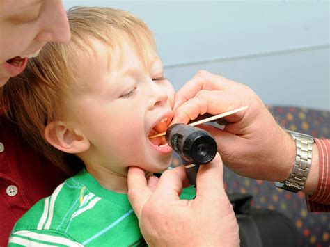 How to tell if a dog has something caught in its throat. Ear, Nose, Mouth & Throat | BabyCenter