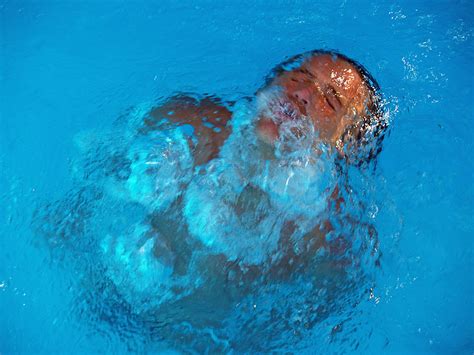 Her children are so naughty 1. File:Air bubbles in a pool as a man surfaces for air.jpg ...