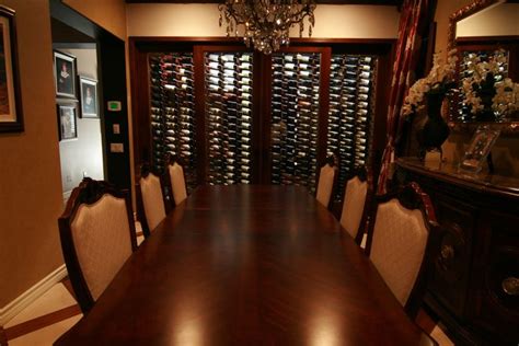 With that many wine offerings, everyone can try something different from around the world. Customer's dining room #closetwinecellars | Wine wall ...