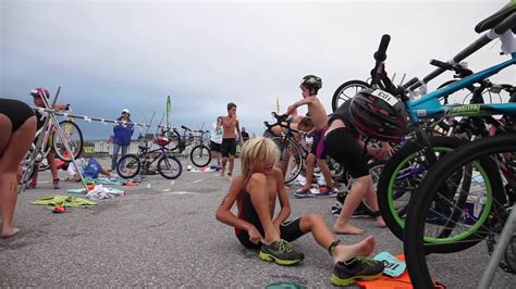 Triathletes compete for fastest overall completion time, racing each segment sequentially with the time transitioning between the disciplines included. Marine Approaches A 9-Year-old Boy In The middle of A ...