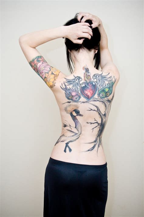 They range from cute and fun. 25 Beautiful Back Tattoos for Women - SloDive