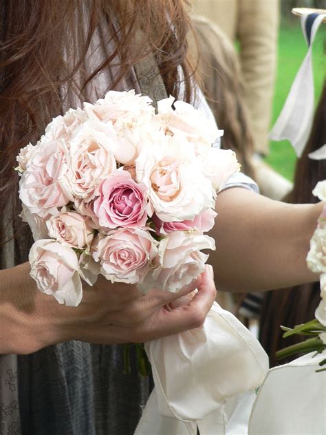 Your bouquet accents your wedding dress and is lovely addition to your wedding flowers: Wedding Bouquet Mini Tea Roses | Flower arrangements, Tea ...