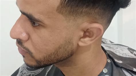 While middle part hairstyles are not all styled. Mid fade curly top /w beard trim - YouTube