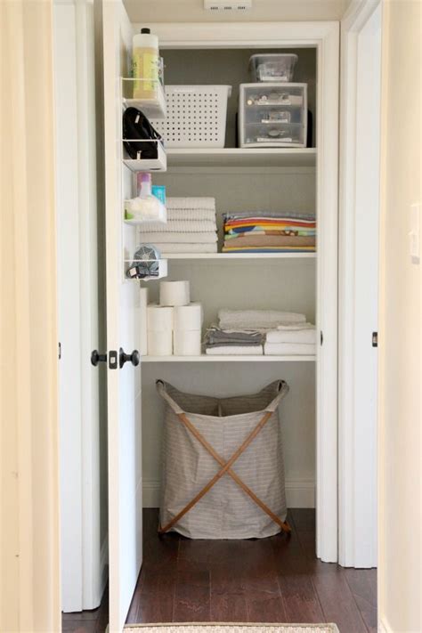 This awesome bathroom linen closet makeover breaks down the entire process from start to finish! Beautiful linen closet doors | Small linen closets, Small ...