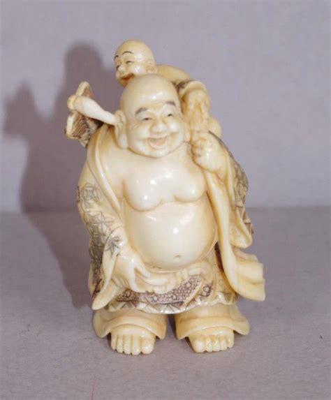 Bis zum ende des 19. Antique Japanese ivory netsuke - Buddha and child c1920 ...