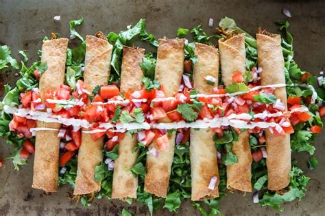 Tortillas are filled with shredded chicken, cheese and spices and then baked until crispy! Gluten Free Chicken Flautas Recipe - Mission Foods