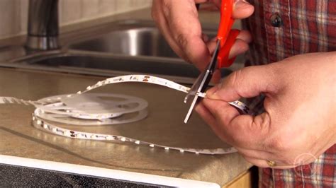 Under cabinet lighting is a great kitchen accent. Installing LED Tape Lighting - YouTube