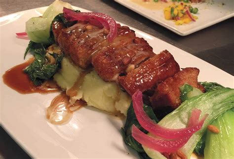 A better approach is to do exactly the opposite: Slow-Roasted Pork Belly with Sauteéd Baby Bok Choy & Pine Nuts