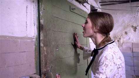 Some houses have a basement that is underground, and an attic to store things. Frightened woman locked herself in the basement trying to ...