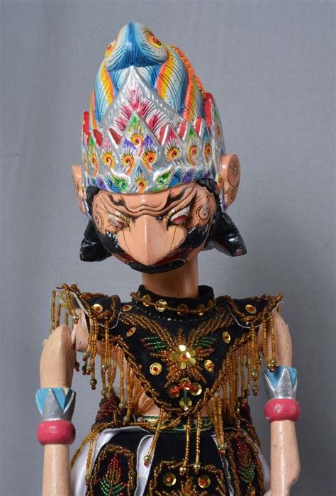 It has a similar type of traditional wooden puppets to bali. Wayang Golek - Rod Puppet - Keriscollection
