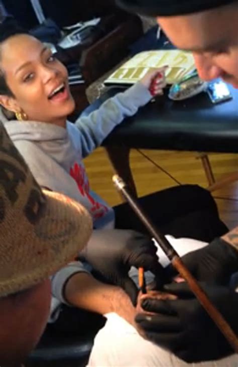 It was a symbolic image of the. Ouch! Rihanna Gets New Tribal Tattoo Chiselled Onto Hand ...