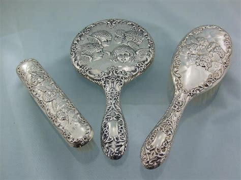 Maybe you would like to learn more about one of these? VINTAGE SILVER CHERUB , REYNOLDS ANGELS DRESSING TABLE SET ...