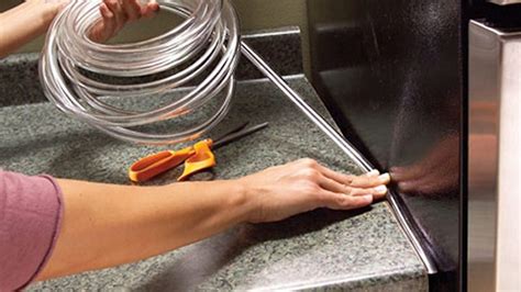 I love a quick win, guys! Use Simple Plastic Tubing to Seal the Gap Between Kitchen ...