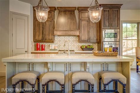 Additional storage was added near the bathtub with a set of floating drawers, which also creates a stunning nook to display artwork. Sorrento Kitchen ivoryhomes.com/model-home | Home kitchens, Kitchen cabinets, Kitchen