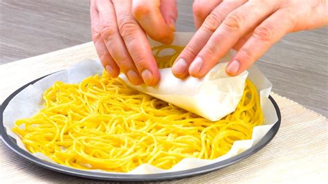 Poi una volta salvato sulla chiavetta qualcosa è andato storto e non si riapre più così ora lo devo improvvisare. Avvolgi gli spaghetti su una cialda di gelato e infornali ...