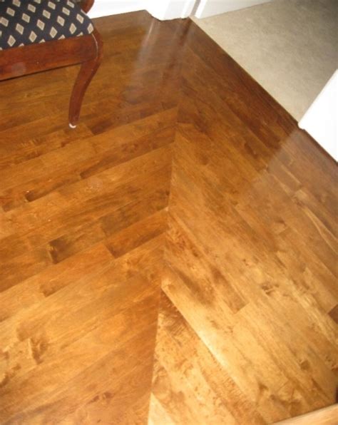 Engineered wood flooring can be either a click/lock system that does not require glue or tongue and groove that does require glue in the header and longitudinal joints. Wood floors Custom installation Miter joints at hallway ...