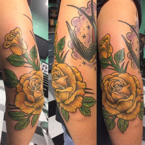 This realistic forearm ink art is created with a lighting candle and a red rose that is centered around a retro compass. A detailed Yellow Rose of Texas by Greg Votaw at Galveston ...