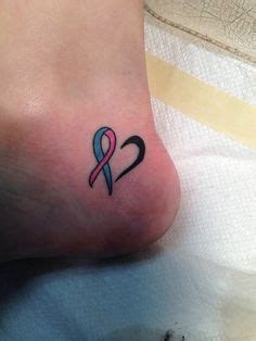 This is a tattoo of a green ribbon (gastroparesis), white ribbon (invisible. 100+ Tattoo Awareness Ribbon Designs and Ideas in 2020 ...