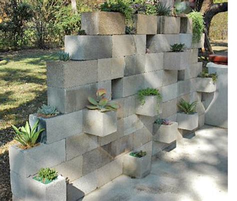 Top off your concrete block wall. Pin by María Marquès on jardin | Cinder block garden ...
