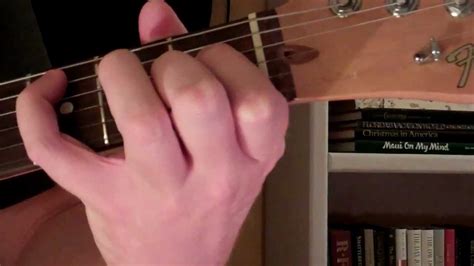 First, put your first finger on the first string, fourth fret. How To Play the C Minor Chord On Guitar (Cm) (1st fret ...