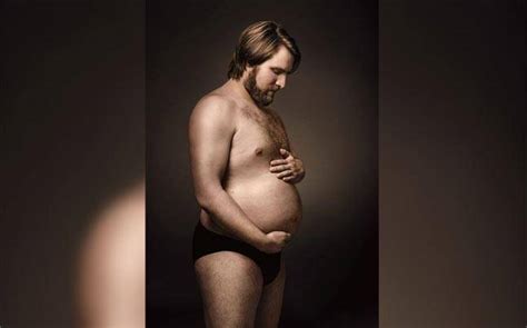 It looks like a pregnant belly. This ad campaign seeks to glorify the beauty of the beer ...