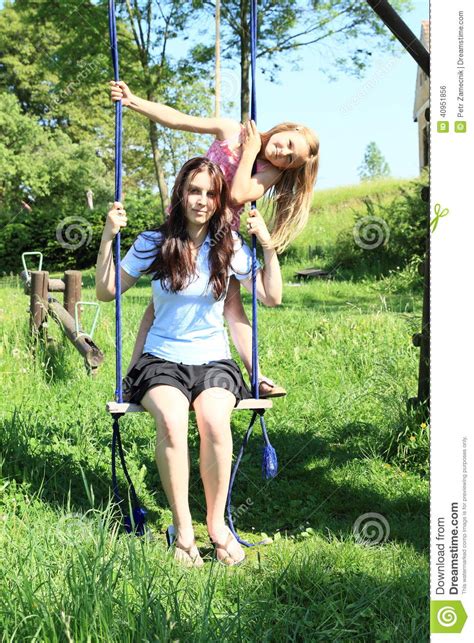 12 disastrous sexting horror stories. Girls swinging on swing stock photo. Image of play ...