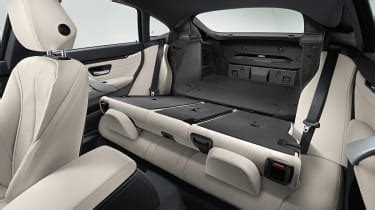 To accommodate the rear doors, the roofline of the gran coupe has been stretched, and as a result there's more interior space and also room for a third rear. BMW 4 Series Gran Coupe 2014 pictures | Auto Express
