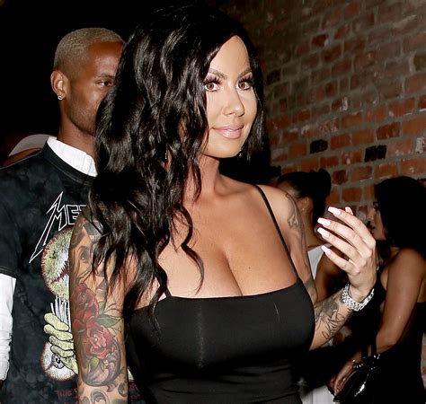 Amber rose, who's become famous for her chic shaved head, tweeted photos of herself this weekend with long hair. Amber Rose Looks Totally Different With Long, Wavy Hair: Pic