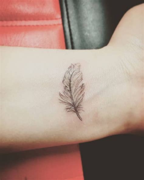 100+ birds feather tattoo meaning ideas (2021) small feather tattoos designs with images Little Feather Tattoo Design | Feather tattoos, Small ...