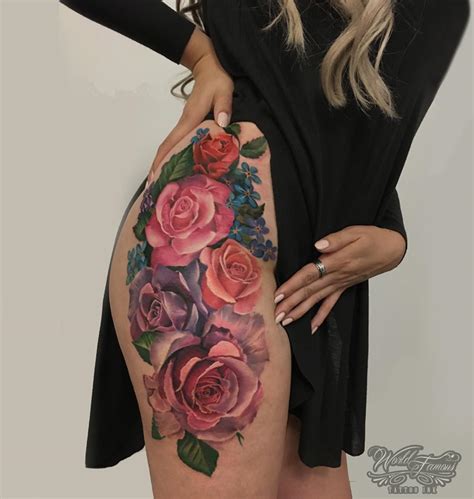 Black rose tattoos done beautifully on her back with thorns and black leaves. Girls Botanical Hip Piece | Best tattoo design ideas