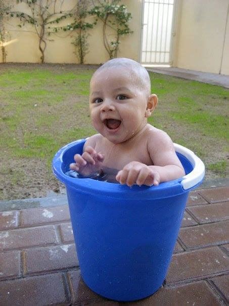 Give your baby a warm bath. Baby Bath Time