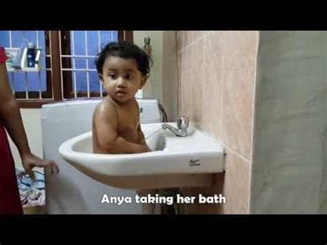 The first years baby bath tub. One year old baby taking bath alone. - YouTube