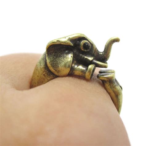 Africa shaped earrings for women online at newchic.com, fashionable and designed africa shaped earrings fit your fashion needs. African Elephant Animal Cuddle Wrap Ring in Bronze - Sizes 6 to 8 · DOTOLY Animal Jewelry · The ...