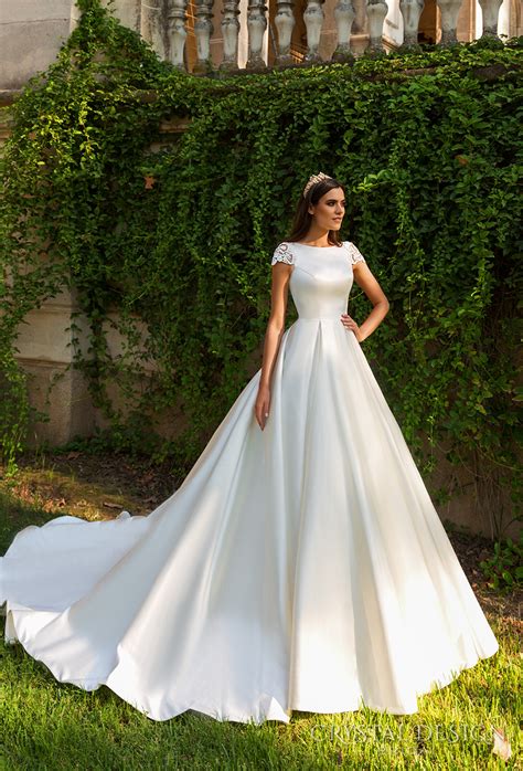 Buy & sell new, sample and used wedding dresses + bridal party gowns. Beautiful Wedding Dresses from the 2017 Crystal Design ...