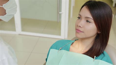 Jobs doctors search baby gallery. Asian doctor visiting young female patient in dentist ...