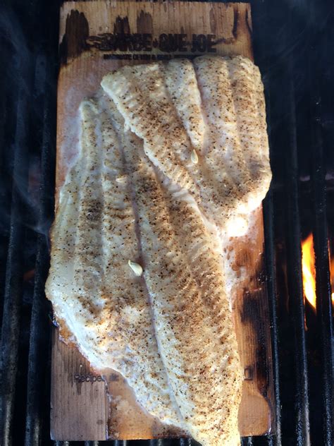 Three catfish fillets served with two sides. Catfish on the grill tonight! | Grilling sides, Grilling ...