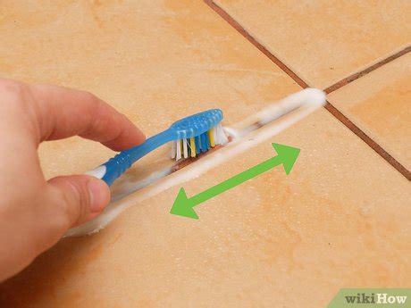 For the grout, you sprinkle baking soda on the lines, spritz with vinegar, and let sit for a minute. 3 Ways to Clean Grout with Vinegar - wikiHow