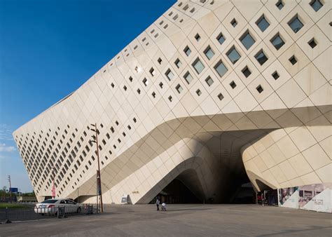 But also use his/her cultural background for a project, like an international evening. Nanjing International Youth Culture Centre by Zaha Hadid ...