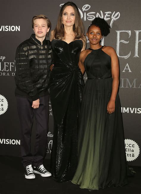 Jolie with shiloh and zahara. Angelina Jolie's Daughter Zahara, 14, Wears Her Natural ...