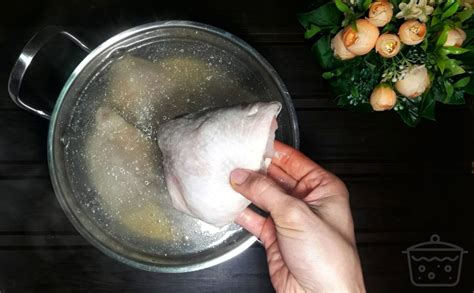 Cut down the side of the bone. How to Boil Chicken Thighs - 12 Easy Steps - How-to-Boil.com