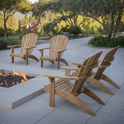 Optional teak ottomans, foot stools and these chairs are comfortable and have some heft. Adirondack Chairs Are the Best Style of Outdoor Patio ...