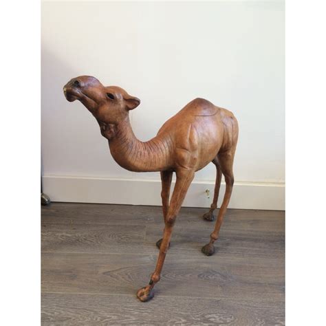 I'd love to see more camel mounts. Vintage Leather Camel Statue | Chairish