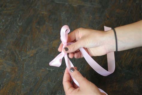 Once you know how to make ribbon bows, it's really quite simple. How to Make a Bow Out of Ribbon | How to Tie a Perfect Bow | DIY Projects