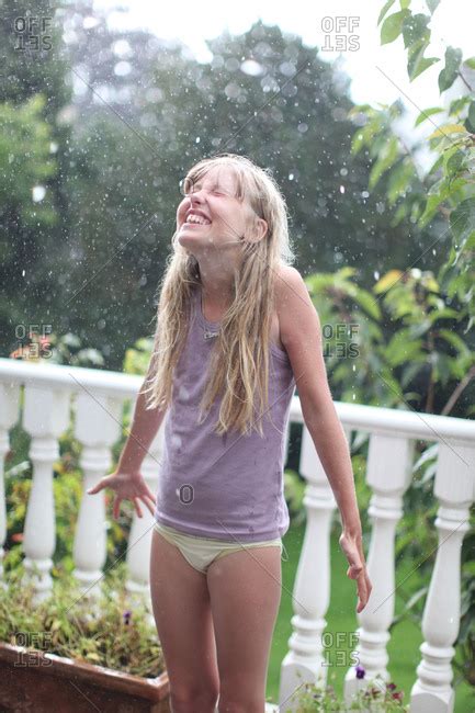 He was santa claus but the farmer did not know about it. wearing underwear in the rain stock photos - OFFSET