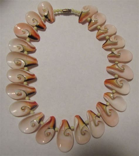 Check spelling or type a new query. Hawaiian Brown Shell Necklaces | ... description this is ...