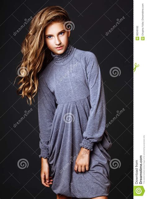 Portrait of nine year old girl. Blond-haired 13-years Old Girl In Studio Stock Photo - Image of female, happy: 90249162