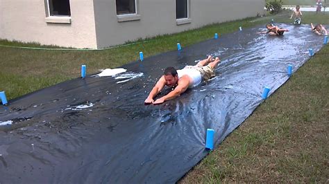 He asked for an ultra wide slip and slide tarp/plastic for his very own slide in his back yard!! Matt sliding down 50 ft slip n slide - YouTube