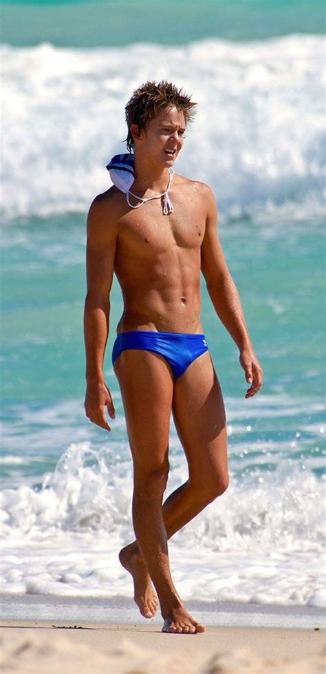 Two guys having fun with tied hot blonde. Pin on speedos